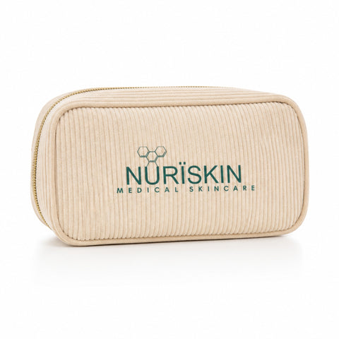 Beige Beauty bag with Nuriskin Medical Skincare logo on a white background